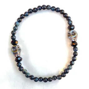 Blue Tiger Eye gemstones, Black Spinel, and Hematite Skull Women’s Stretch Bracelet