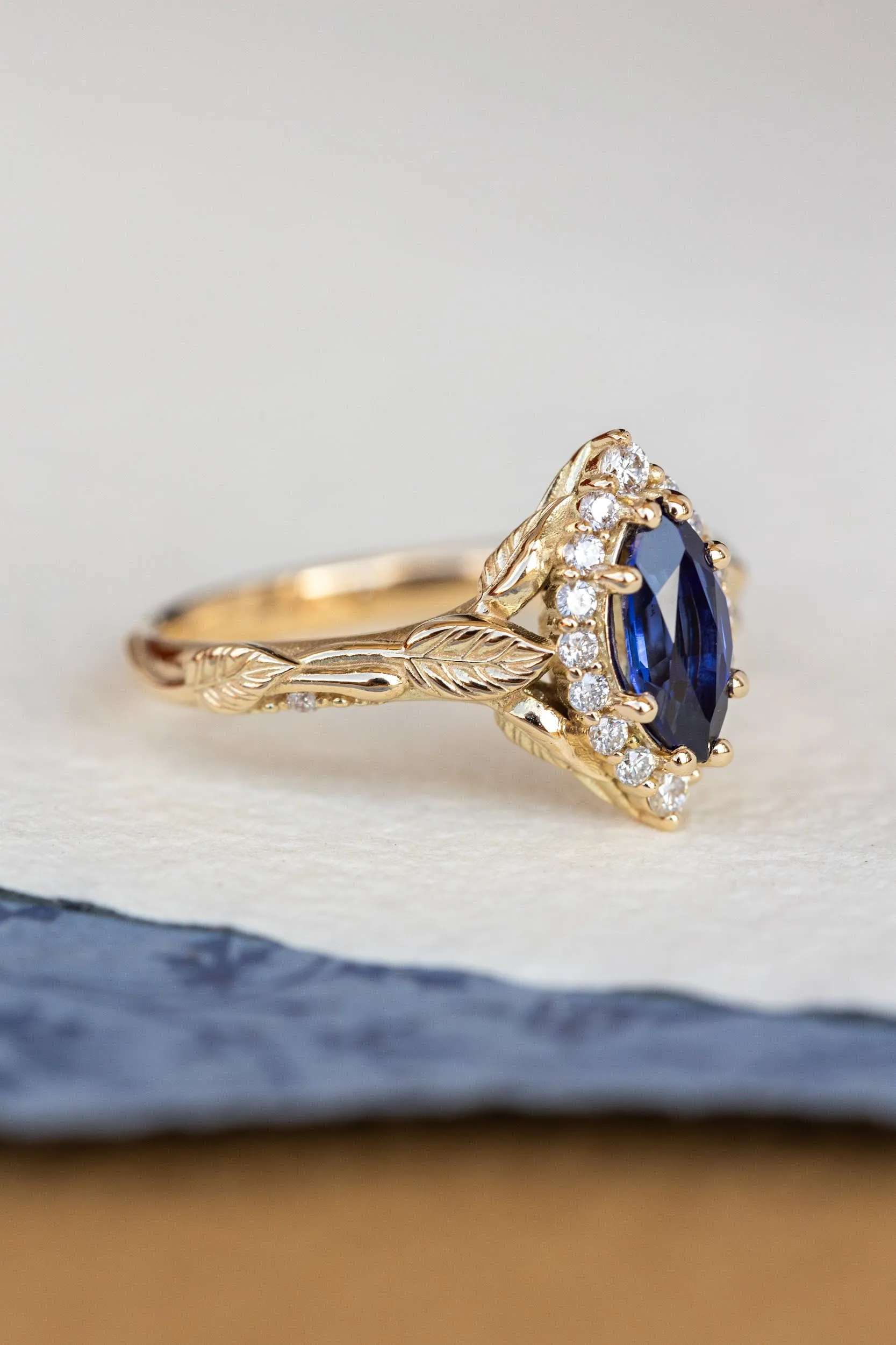 Dark blue lab sapphire engagement ring, gold proposal ring with marquise cut gemstone and diamond halo / Florentina