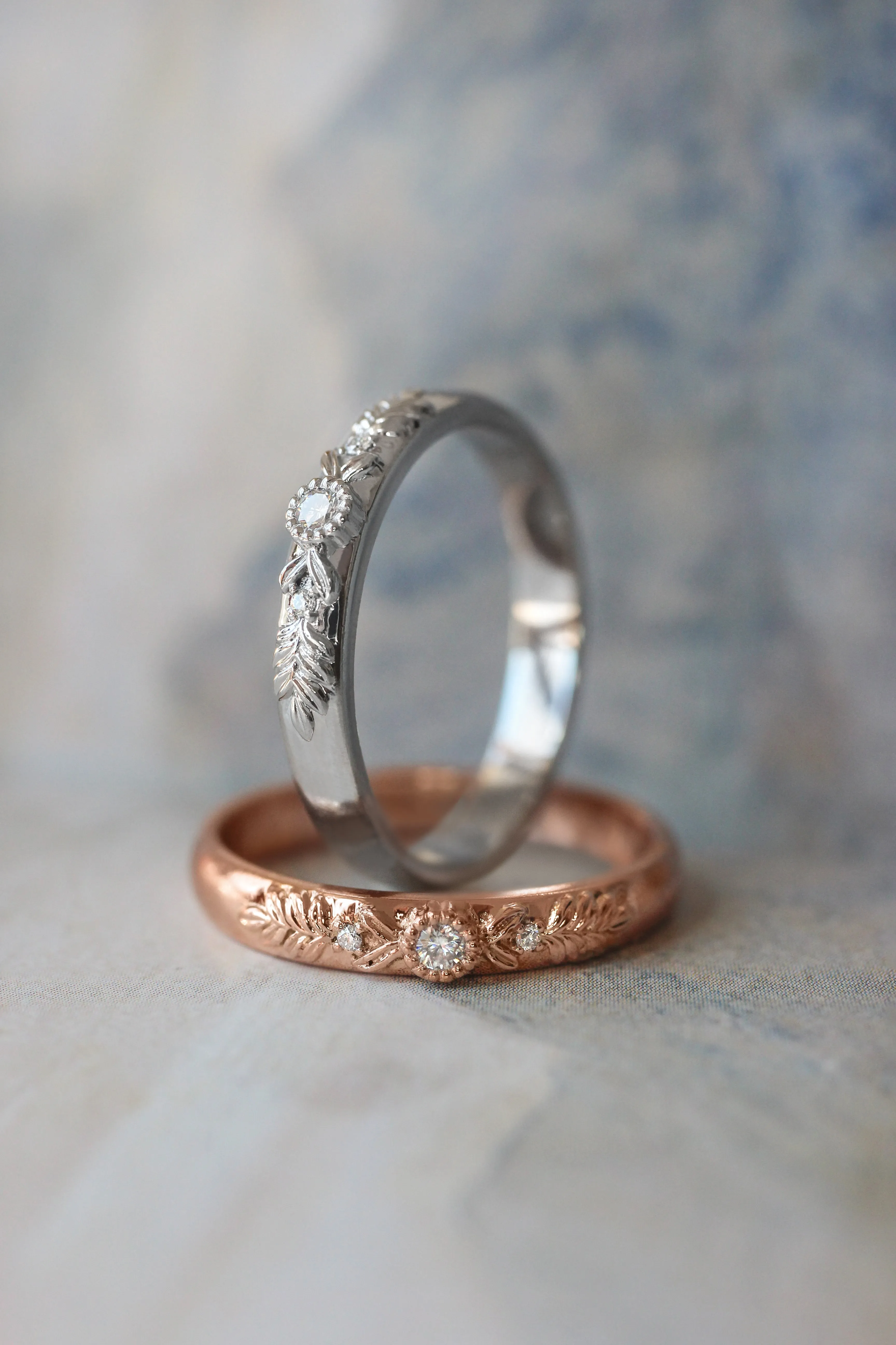 White gold wedding band with three diamonds, wreath ring